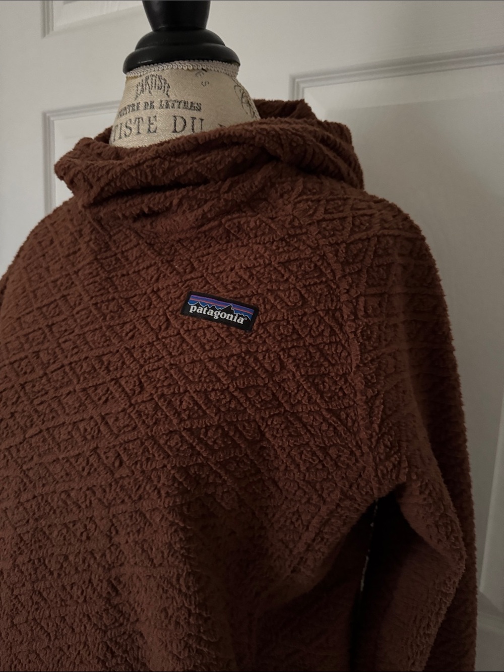 Patagonia Brown Diamond-Textured Hooded pullover.